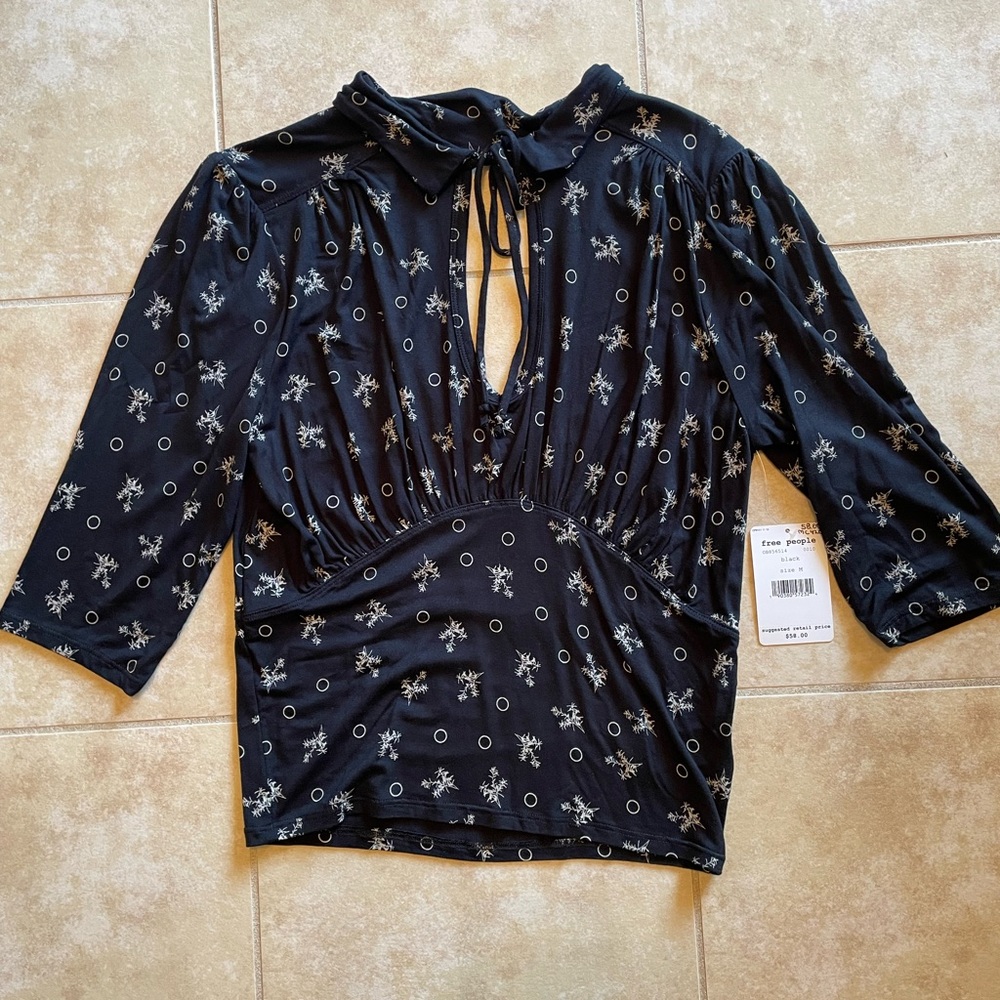 Free People floral cutout blouse size Medium